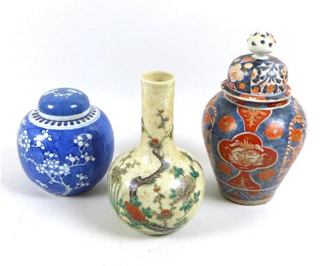 A group of Chinese ceramic vases, comprising a bottle vase, famille vert decorated with prunus blossom, artemisia leaf mark t