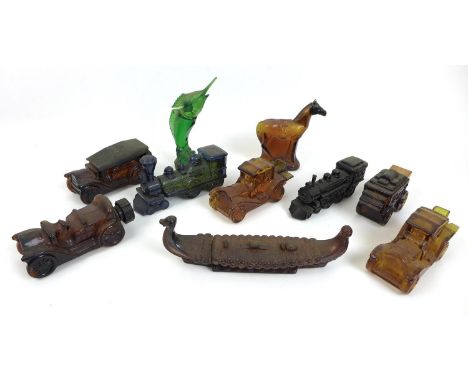 A collection of vintage 1970s novelty aftershave bottles, shaped as cars, trains, a viking boat, a horse and a swordfish. (10