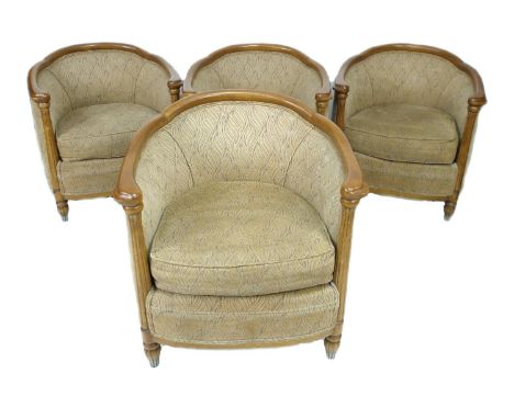A set of four modern tub armchairs, in Art Deco style, with shaped stained wooden frames, cream foliate upholstery, reeded su