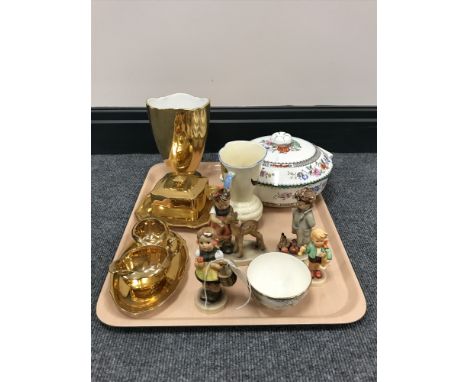 A tray containing four Goebel figurines, weighed Heath miniature jug, Spode china rose, terrine with two cups and four egg cu