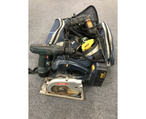A bag containing assorted power tools 