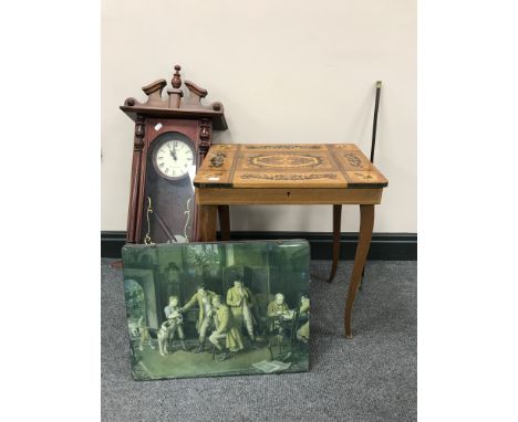 A Victorian style music table, a wall clock, a framed print under glass depicting a huntsman together with a gun cleaning rod