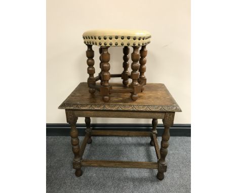 A carved oak lamp table and a hexagonal stool 