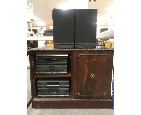 A set of mahogany shelves, mahogany speaker cabinet containing a five piece Phillips separate HI-FI and speakers