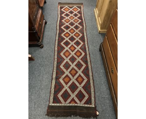 A Meshwani carpet runner 253 cm x 66 cm