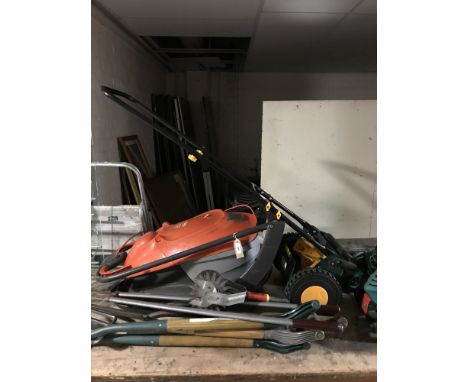 A Flymo easy glide 3000v electric lawnmower, together with a push lawnmower, a pair of folding aluminium steps and a bundle o