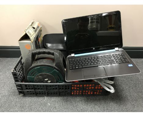 A box containing three laptops, including two HP and one Time. Together with a laptop bag and assorted power tools