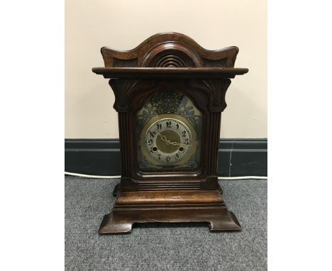 A mahogany cased Smiths Enfield bracket clock with brass and silvered dial 