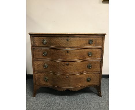 A 19th century Chippendale style mahogany serpentine fronted four drawer chest on long bracket feet, width 93cm CONDITION REP