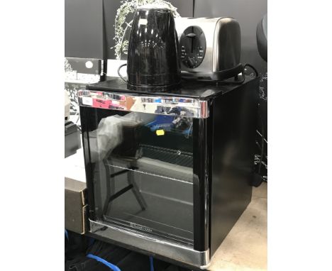 A Russell Hobbs bench top fridge, kettle and four slot toaster 