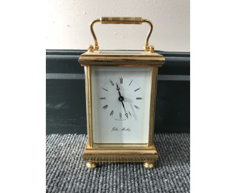 A modern John Mosley brass carriage clock, eleven jewel movement with platform escapement