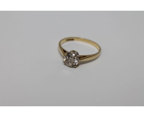 An 18ct gold solitaire diamond ring, the brilliant cut stone weighing an estimated 1.05 carat CONDITION REPORT: The ring size