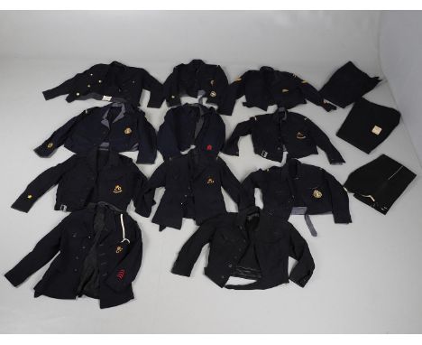 AN INTERESTING COLLECTION OF CIVIL DEFENCE UNIFORM JACKETS WITH A VARIETY OF REGIONAL INSIGNIA. A collection of Men's and Wom