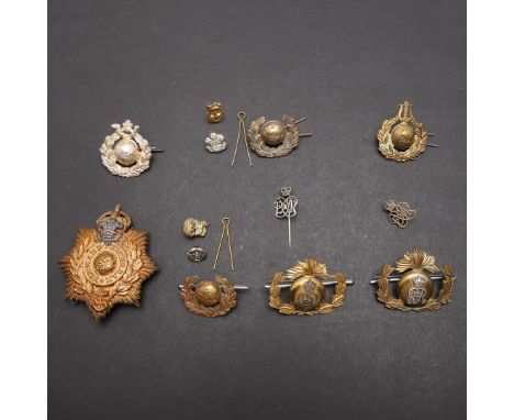 A COLLECTION OF ROYAL MARINES BANDSMAN'S BADGES TO INCLUDE A GEORGE V ROYAL YACHT BADGE. A collection of bandsman's badges to