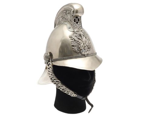 A LATE 19TH OR EARLY 20TH CENTURY MERRYWEATHER FIRE BRIGADE OFFICER'S HELMET. With a raised comb decorated with a fire-breath
