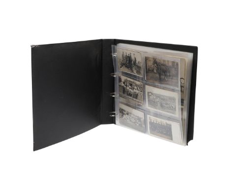 AN EXTENSIVE ALBUM OF FIRST WORLD WAR POSTCARDS. A collection of 180 Great War postcards, a wide variety of subjects, portrai