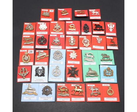 A COLLECTION OF THIRTY SIX BADGES FOR HERTFORDSHIRE, LINCOLNSHIRE AND OTHER REGIMENTS. A collection of badges for various Reg