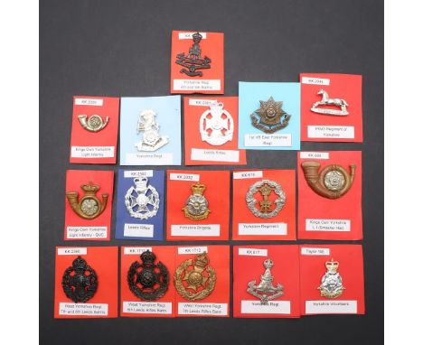 A COLLECTION OF SIXTEEN BADGES FOR THE YORKSHIRE REGIMENT. A collection of badges for the Yorkshire Regiment including Yorksh