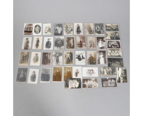 A COLLECTION OF FORTY ONE FIRST WORLD WAR POSTCARDS OF WOMEN IN VARIOUS UNIFORMS. An interesting collection of postcards of w