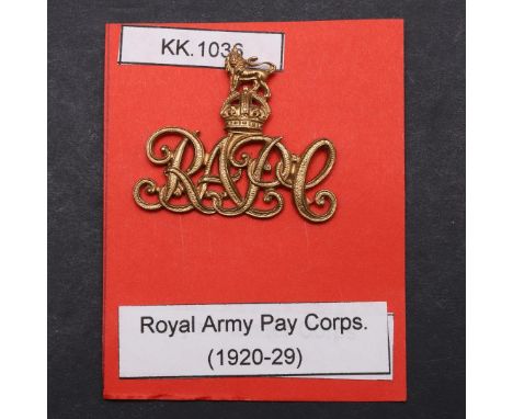 A ROYAL ARMY PAY CORPS OFFICERS BADGE, 1920-29 PATTERN. A Royal Army Pay Corps badge with scrolling RAPC beneath a lion and c