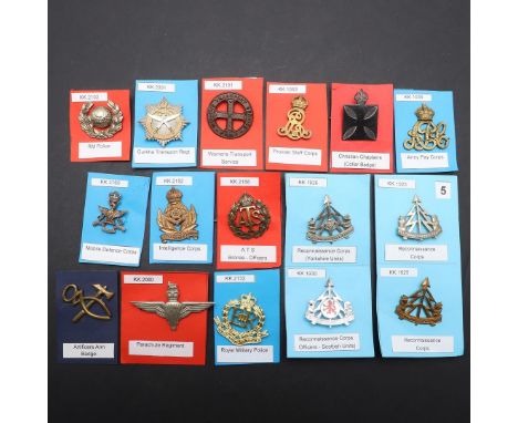 A COLLECTION OF SIXTEEN BADGES FOR THE INTELLIGENCE CORPS AND OTHERS. A collection of sixteen badges including examples for t