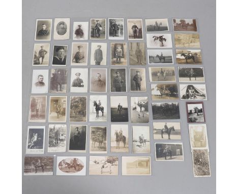 A COLLECTION OF FIFTY POSTCARDS OF FIRST WORLD SOLDIERS IN UNIFORM, INDIVIDUALLY POSED, MANY ON HORSEBACK. An interesting col