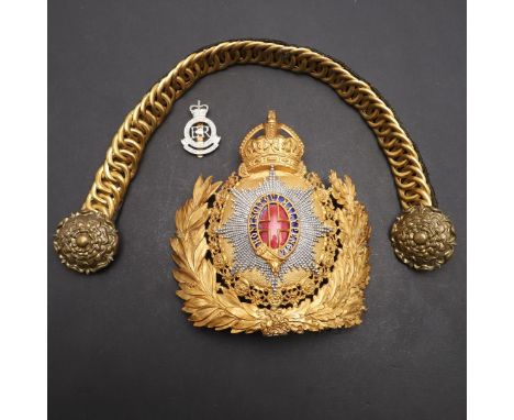 A CAVALRY OFFICERS FULL DRESS HELMET PLATE AND CHIN STRAP. 1902-1952. A Full Dress Household Cavalry Officer's Helmet Plate w