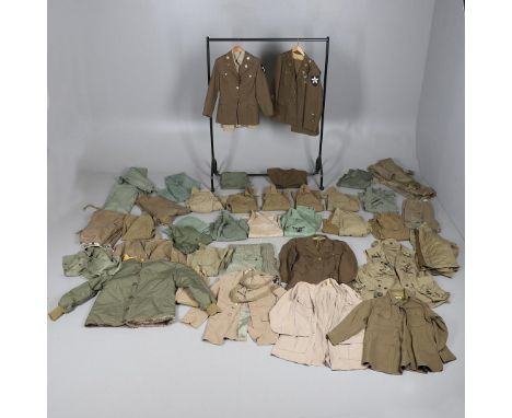 A COLLECTION OF AMERICAN ARMY UNIFORM TO INCLUDE JACKETS, SHIRTS AND TROUSERS. A collection of uniform including paratroopers