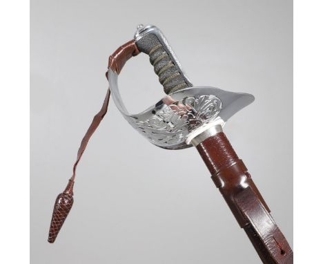 A ROYAL MARINES 1897 PATTERN SWORD BY WILKINSON. With an 82 cm pointed blade with partial fuller, decorated with Elizabeth II