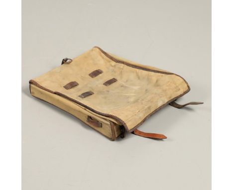 A FIRST WORLD WAR GERMAN BACKPACK. A First World War German backpack or Tornister, of mid war type in pale brown canvas with 