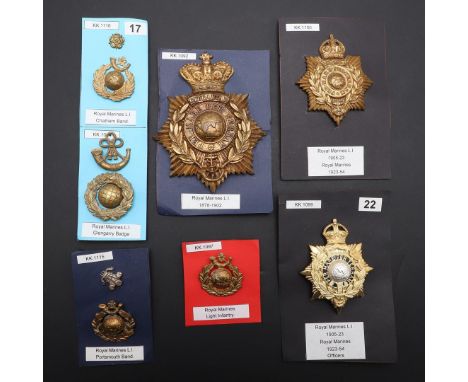 A COLLECTION OF SEVEN ROYAL MARINES LIGHT INFANTRY BADGES TO INCLUDE AN 1878-1902 PATTERN BADGE. A collection of Royal Marine