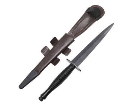 A THIRD PATTERN FAIRBURN SYKES TYPE FIGHTING KNIFE BY WILLIAM RODGERS. With a 17cm double edged pointed blade on a fluted gri