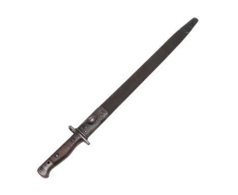 A FIRST WORLD WAR WILKINSON 1907 PATTERN BAYONET AND SCABBARD. With a 43 cm pointed and fullered blade marked Wilkinson benea
