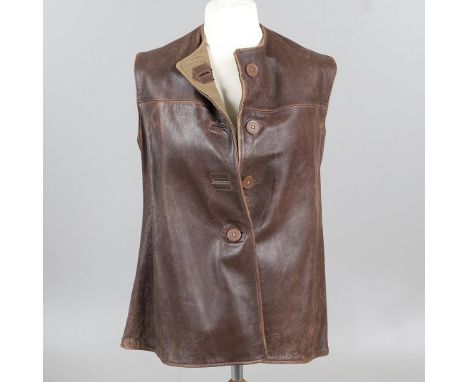 A SECOND WORLD WAR WOMEN'S AUXILIARY AIR FORCE LEATHER JERKIN. A brown leather four button jerkin, with label 'Jerkins Leathe