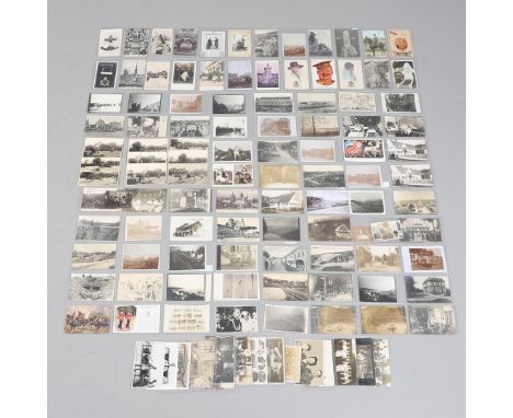 A COLLECTION OF OVER ONE HUNDRED POSTCARDS AND PHOTOGRAPHS OF FIRST WORLD WAR SUBJECTS. An interesting collection of postcard