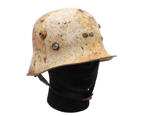 AN M1927 PATTERN IRISH CIVIL DEFENCE STEEL HELMET. A Vickers 1927 pattern steel helmet, similar in design to the German 1916 