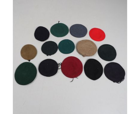 A COLLECTION OF MILITARY UNIFORM BERETS. A collection of Military uniform berets to include a beret with Timber Corps badge, 