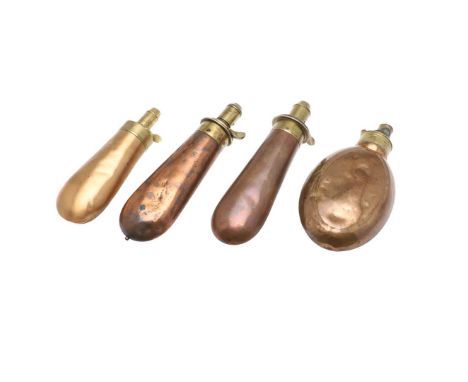 A COLLECTION OF FOUR VICTORIAN AND LATER COPPER BODIED POWDER FLASKS. A collection of four powder flasks with plain bodies, t