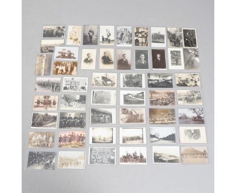A COLLECTION OF FIFTY POSTCARDS OF FIRST WORLD WAR AND LATER SUBJECTS TO INCLUDE BANDSMEN. An interesting collection of fifty