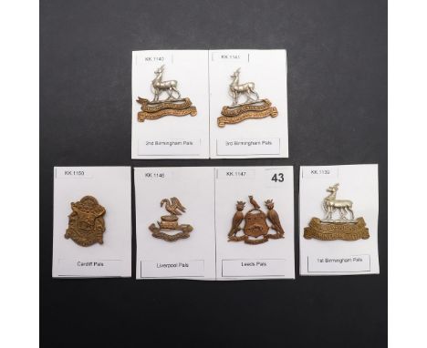 A COLLECTION OF PALS BATTALION CAP BADGES. A collection of six cap badges for First World Pals Battalion cap badges to includ