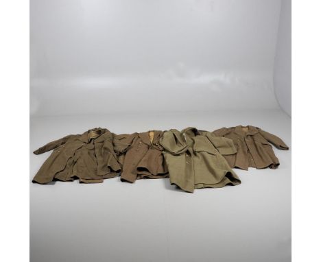 A SECOND WORLD WAR PERIOD ARMY GREATCOAT AND FOUR OTHERS SIMILAR. An Army Greatcoat, dismounted 1940 pattern size 8 by S.Simp