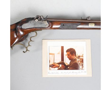 A LARGE SWISS TARGET RIFLE WITH A PHOTOGRAPH OF PRINCE CHARLES WITH THIS RIFLE. With an 82 cm octagonal rifled barrel, approx