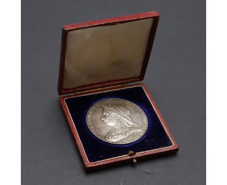 A QUEEN VICTORIA SOUVENIR MEDAL FOR THE DIAMOND JUBILEE. A silvered souvenir Medal, 1897, Crowned and veiled bust l. Reverse 