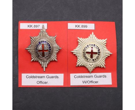 A SILVER OFFICER'S COLDSTREAM GUARDS CAP BADGE AND ANOTHER WARRANT OFFICERS BADGE. A Coldstream Guards silver cap badge with 