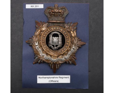 A FINE NORTHAMPTONSHIRE REGIMENT OFFICERS HELMET PLATE. A Victorian Northamptonshire Regiment helmet plate with castle and ke