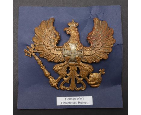 AN IMPERIAL GERMAN PRUSSIAN RESERVIST'S HELMET PLATE. A First World War Prussian Reservist's Other Ranks pickelhaube plate, 1