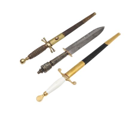 A WILKINSON SWORD PRESENTATION DAGGER AND TWO OTHERS. A Wilkinson Sword dagger with 27 cm blade marked 'Twenty-Fifth Annivers