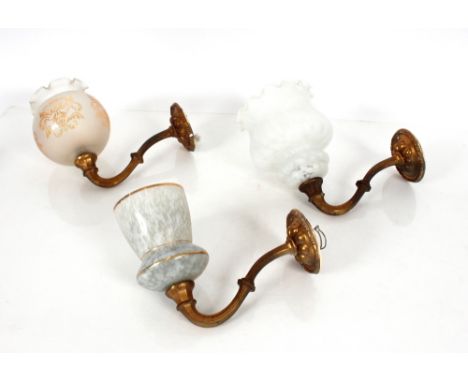 A mottled glass and gilt metal wall light; another smaller similar; and another with bulbous coloured etched shade 