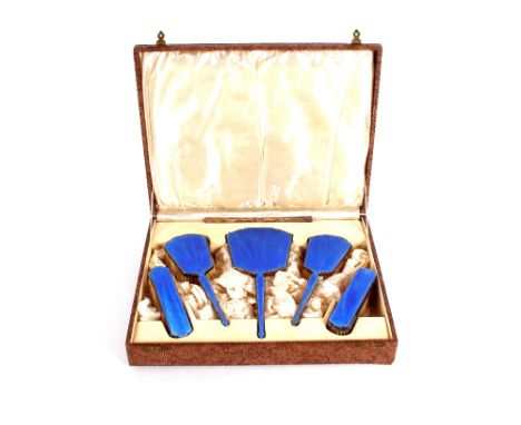 A cased silver and enamel Art Deco dressing table set