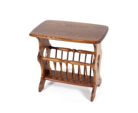 An Ercol coffee table / magazine rack, 54cm wide 